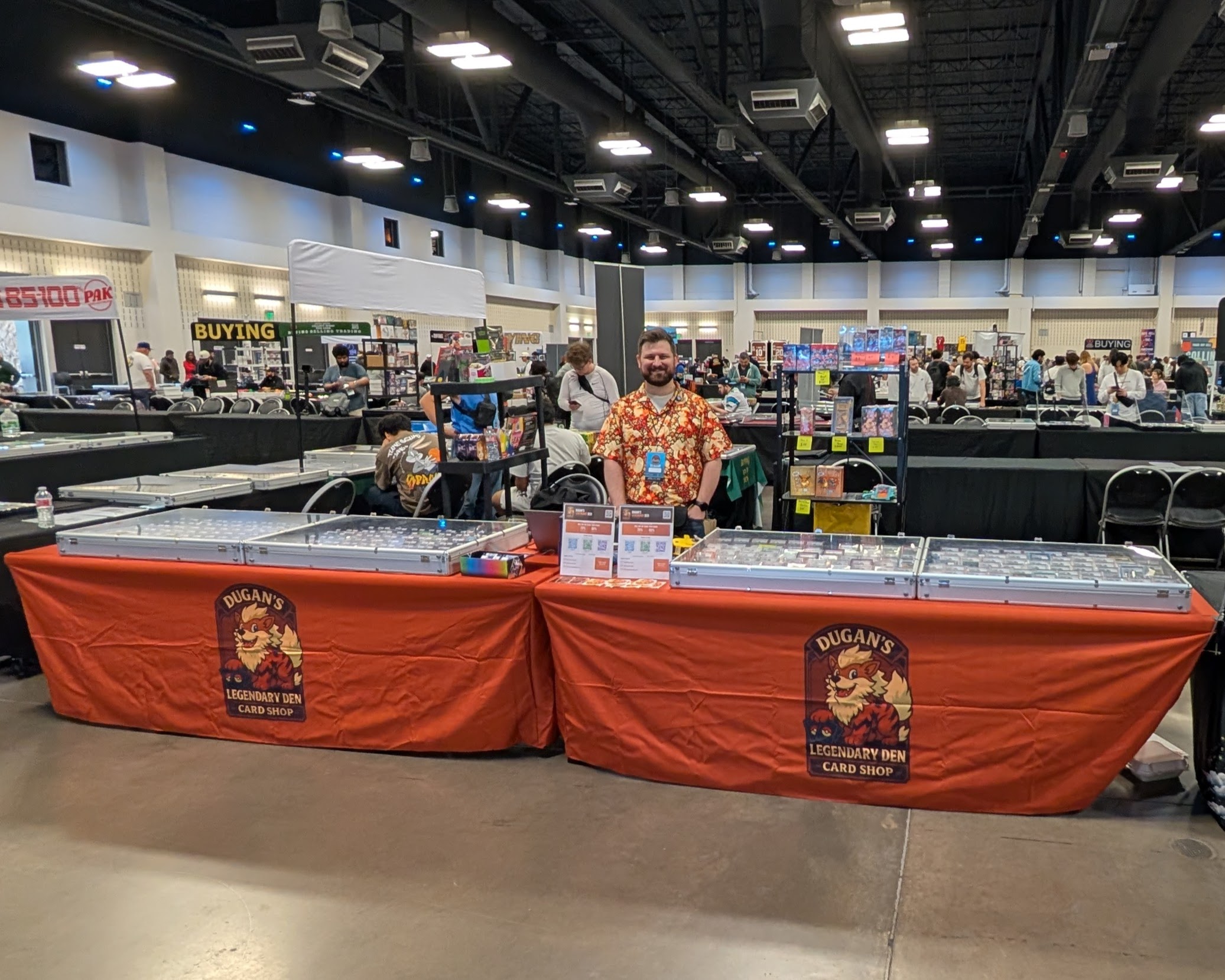 Dugan's Legendary Den vendor booth at a Texas card show